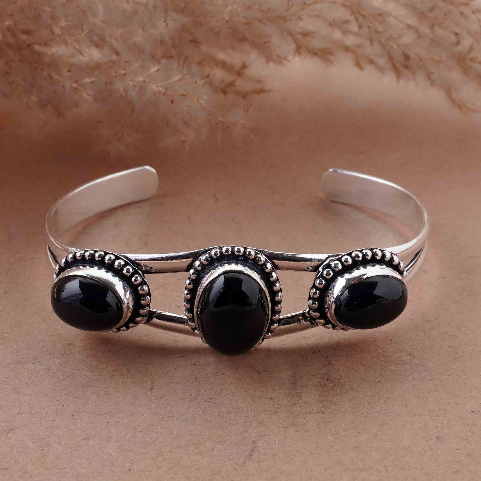 Natural Black Onyx Sterling Silver Plated Handmade Cuff Bangle: Product ID: 260429152256 Product - Handmade Silver Plated Cuff Bangle Metal - 92.5 Sterling Silver Plated Bangle Size - 6.5x4.5 CM (Adjustable) Gemstone - Black Onyx Gemstone Origin - India Gemstone S