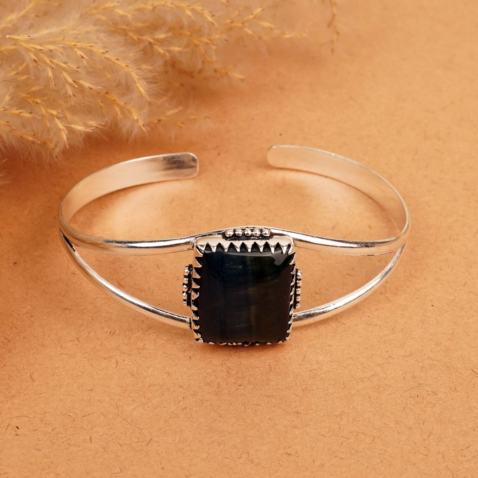 Natural Black Tiger Eye Sterling Silver Plated Handmade Cuff Bangle: Product ID: 260412130520 Product - Handmade Silver Plated Cuff Bangle Metal - 92.5 Sterling Silver Plated Bangle Size - 7.5x5.5 CM (Adjustable) Gemstone - Black Tiger Eye Gemstone Origin - South Afric