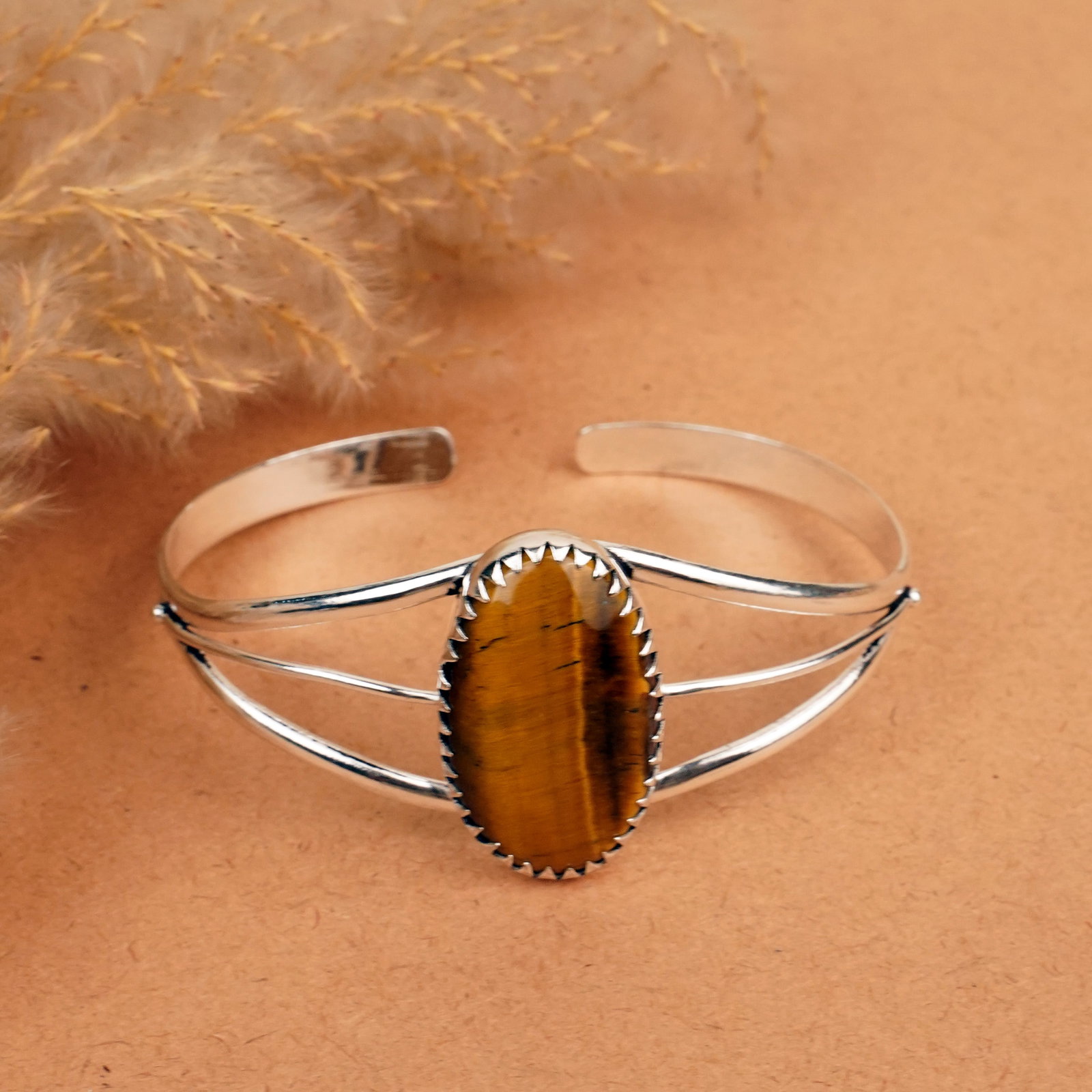 Natural Tiger Eye Sterling Silver Plated Handmade Cuff Bangle: Product ID: 260412130332 Product - Handmade Silver Plated Cuff Bangle Metal - 92.5 Sterling Silver Plated Bangle Size - 7.5x5.5 CM (Adjustable) Gemstone -Tiger Eye Gemstone Origin - South Africa Gemst