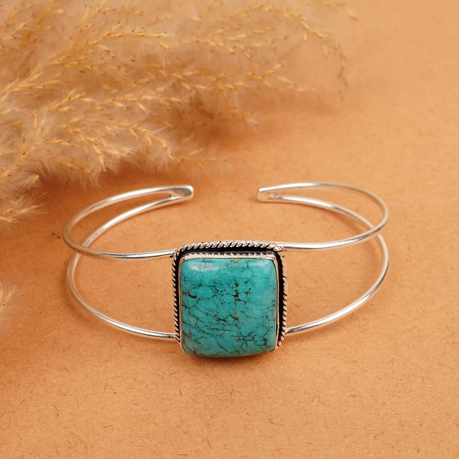 Natural Turquoise Sterling Silver Plated Handmade Cuff Bangle: Product ID: 260412114208 Product - Handmade Silver Plated Cuff Bangle Metal - 92.5 Sterling Silver Plated Bangle Size - 7.5x5.5 CM (Adjustable) Gemstone - Turquoise Gemstone Origin - Tibet Gemstone Si