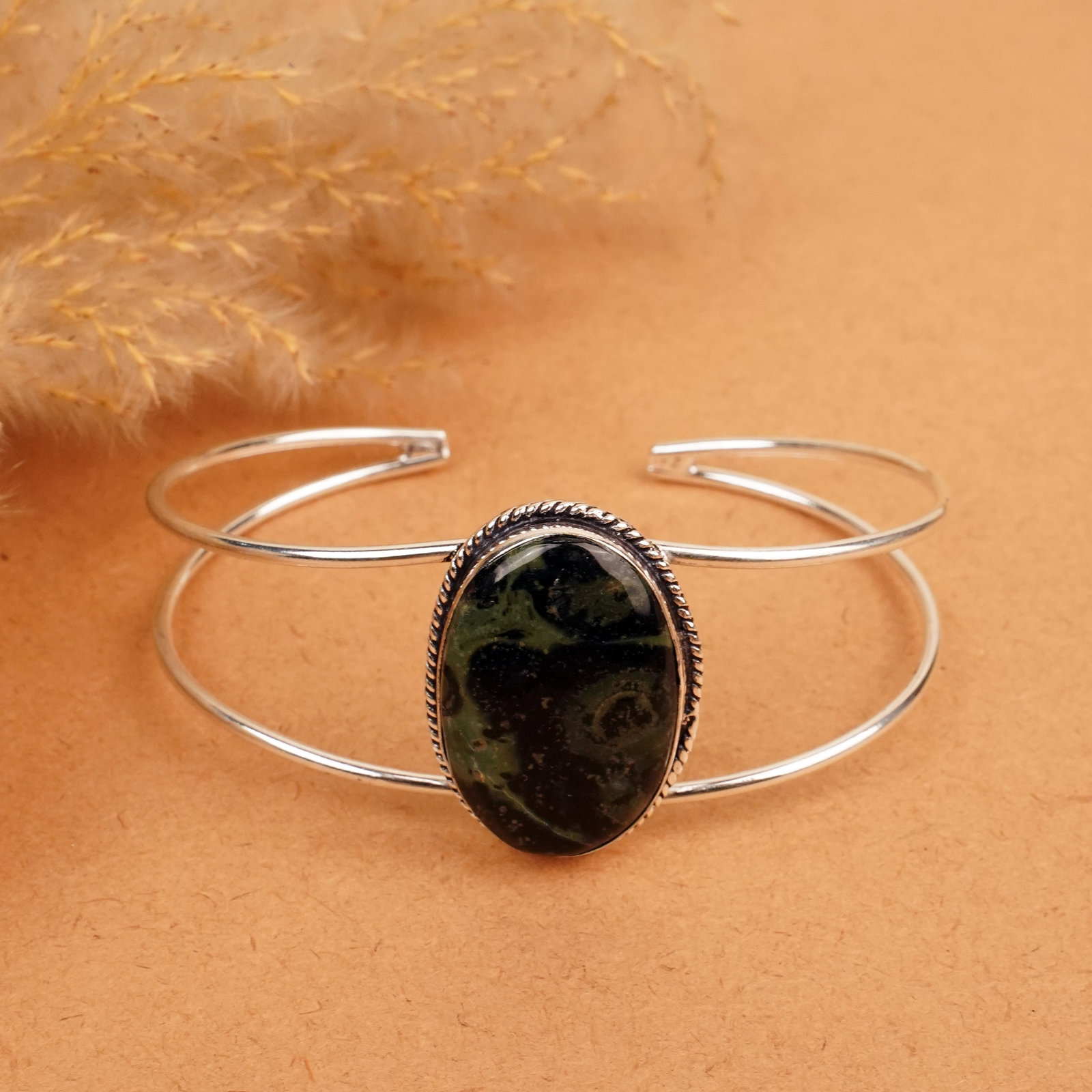 Natural Kambaba Jasper Sterling Silver Plated Handmade Cuff Bangle: Product ID: 260412113853 Product - Handmade Silver Plated Cuff Bangle Metal - 92.5 Sterling Silver Plated Bangle Size - 7x5.5 CM (Adjustable) Gemstone - Kambaba Jasper Gemstone Origin - Madagascar Gem
