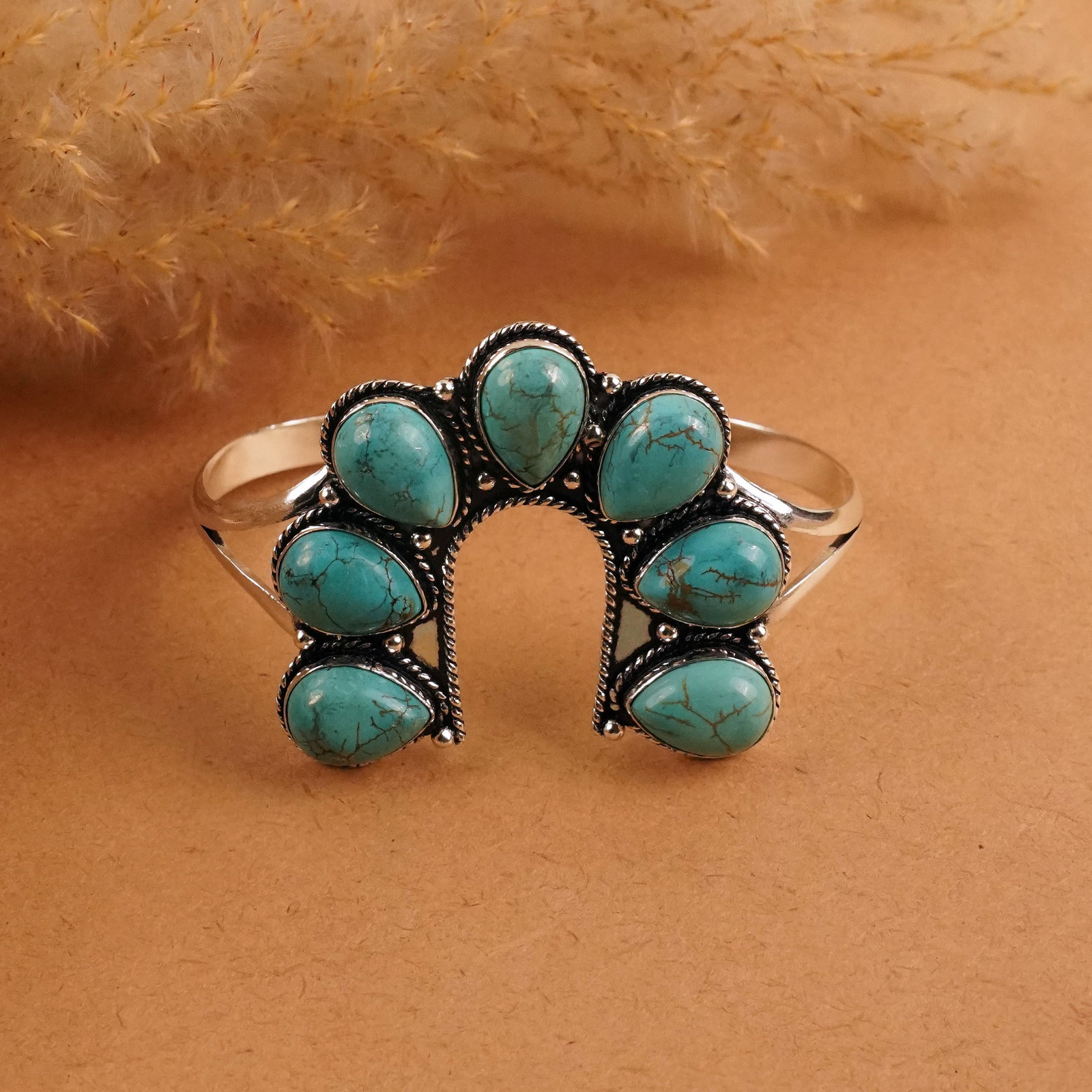Natural Turquoise Sterling Silver Plated Handmade Cuff Bangle: Product ID: 260411164612 Product - Handmade Silver Plated Cuff Bangle Metal - 92.5 Sterling Silver Plated Bangle Size - 6.5x4.5 CM (Adjustable) Gemstone - Turquoise Gemstone Origin - Tibet Gemstone Si