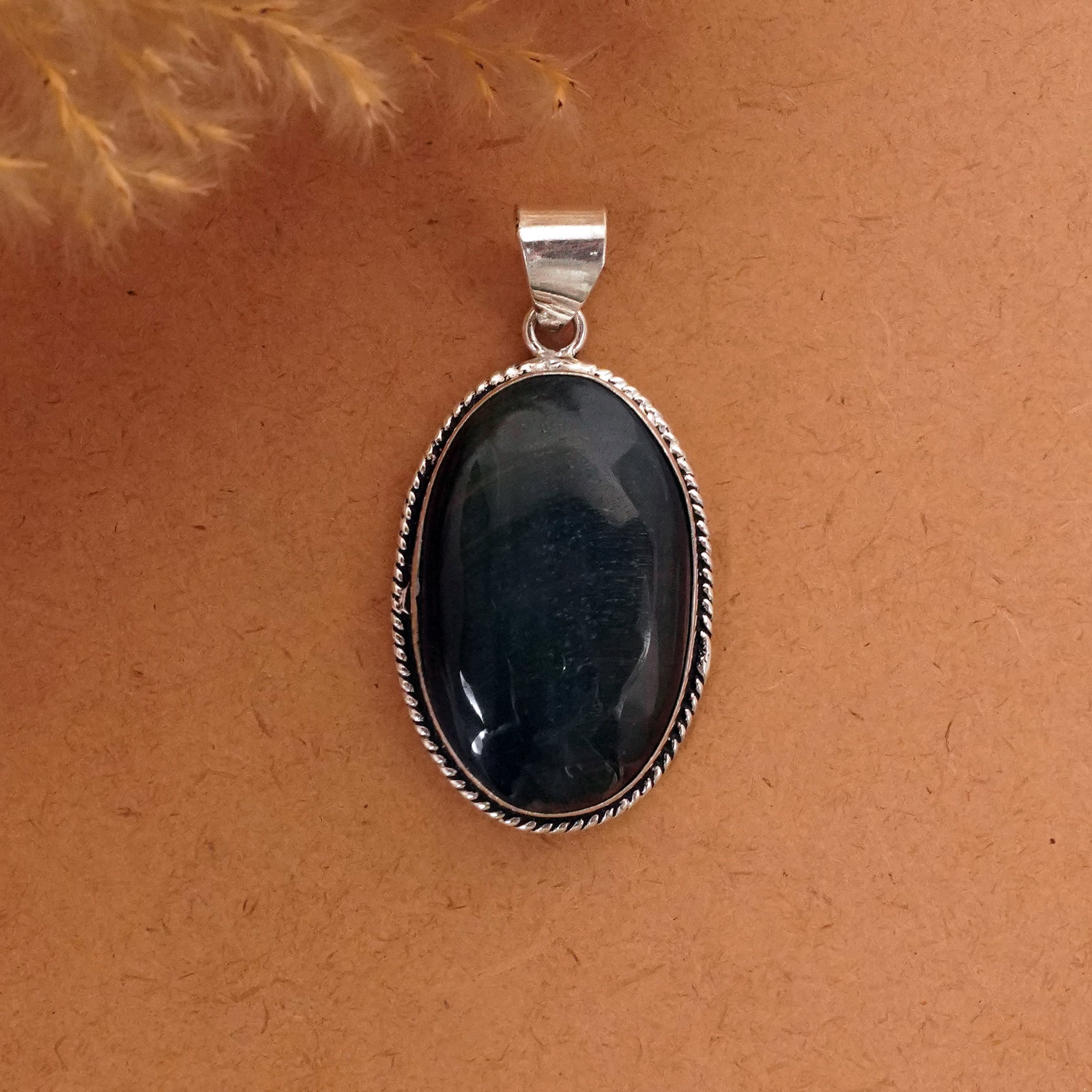Natural Black Tiger Eye Sterling Silver Plated Handmade Pendant: Product ID: 260411134916 Product - Handmade Silver Plated Pendant Metal - 92.5 Sterling Silver Plated Pendant Size - 4x2.5 CM Gemstone - Black Tiger Eye Gemstone Origin - South Africa Gemstone Shape -