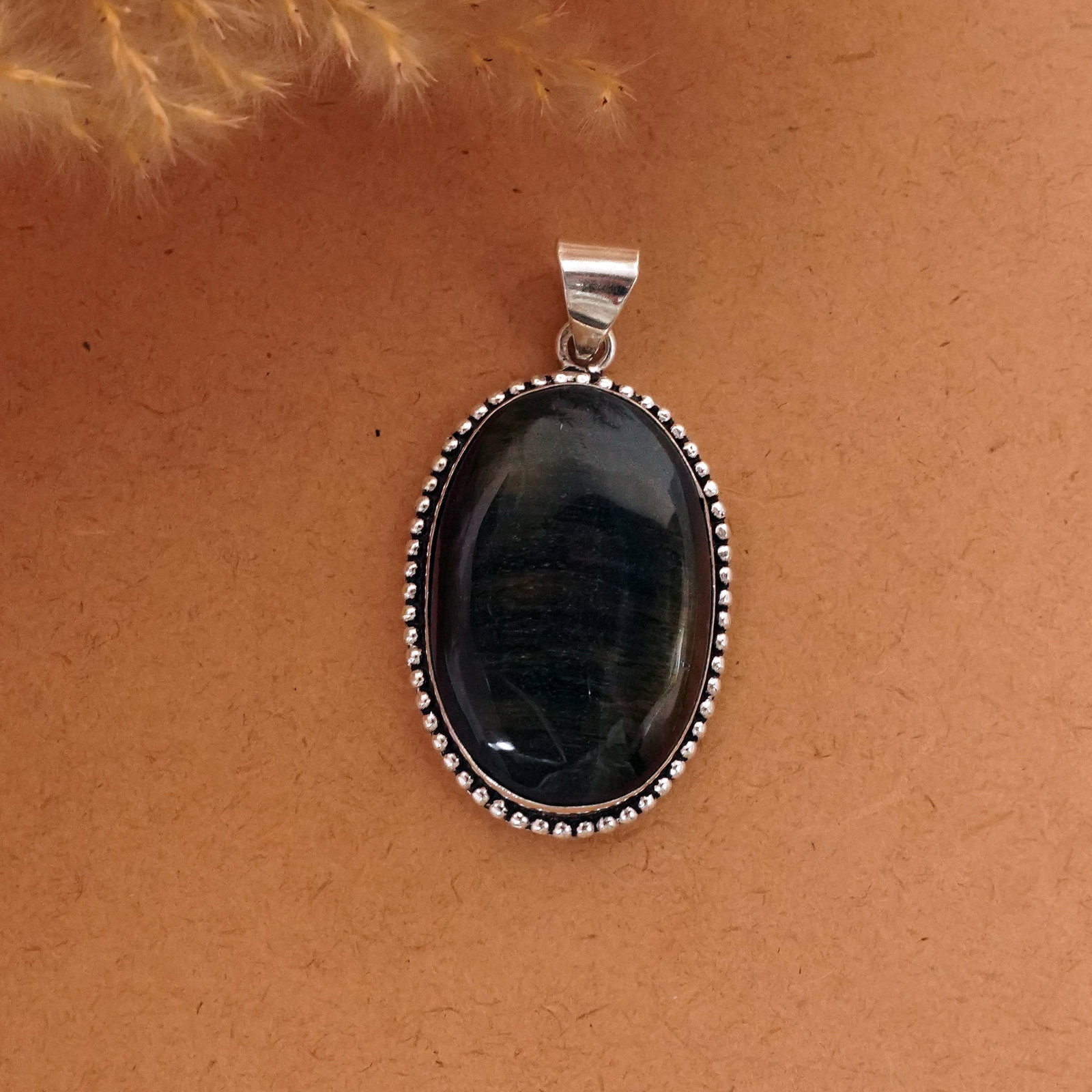 Natural Black Tiger Eye Sterling Silver Plated Handmade Pendant: Product ID: 260411134447 Product - Handmade Silver Plated Pendant Metal - 92.5 Sterling Silver Plated Pendant Size - 4x2.5 CM Gemstone - Black Tiger Eye Gemstone Origin - South Africa Gemstone Shape -