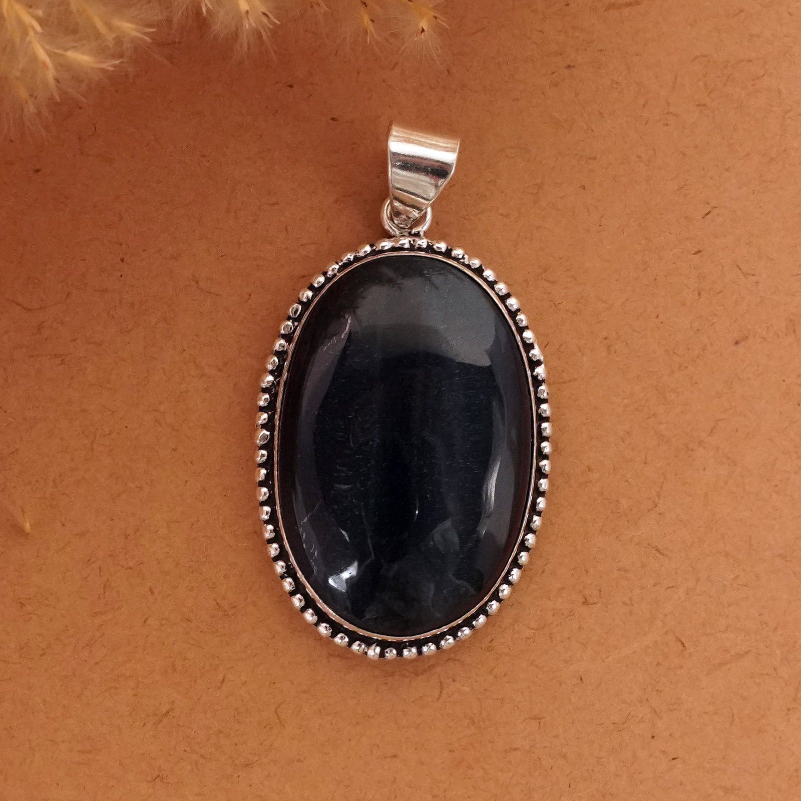 Natural Black Tiger Eye Sterling Silver Plated Handmade Pendant: Product ID: 260411133923 Product - Handmade Silver Plated Pendant Metal - 92.5 Sterling Silver Plated Pendant Size - 4.5x3 CM Gemstone - Black Tiger Eye Gemstone Origin - South Africa Gemstone Shape -