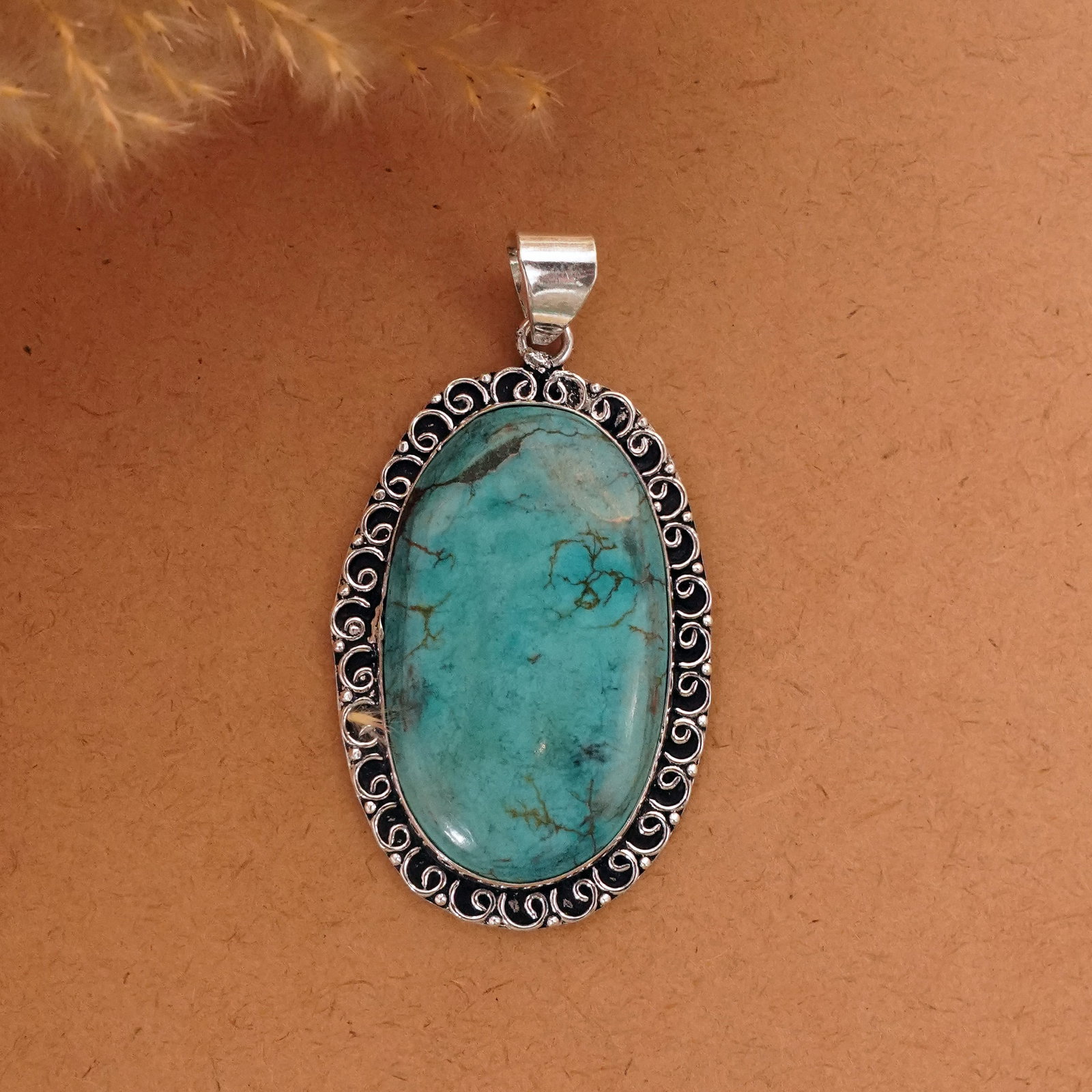 Natural Turquoise Sterling Silver Plated Handmade Asian Pendant: Product ID: 260411133827 Product - Handmade Silver Plated Pendant Metal - 92.5 Sterling Silver Plated Pendant Size - 5x3.5 CM Gemstone - Turquoise Gemstone Origin - Tibet Gemstone Shape - Oval Pendant