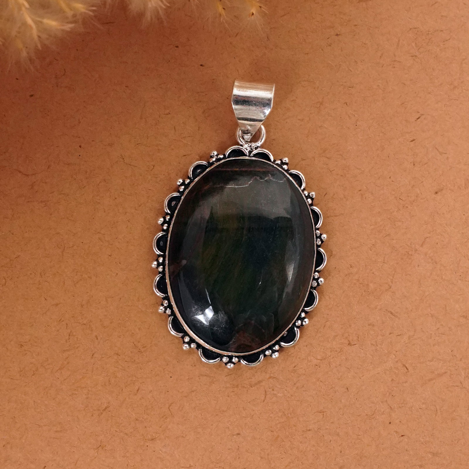 Natural Black Tiger Eye Sterling Silver Plated Handmade Pendant: Product ID: 260411133736 Product - Handmade Silver Plated Pendant Metal - 92.5 Sterling Silver Plated Pendant Size - 4x3 CM Gemstone - Black Tiger Eye Gemstone Origin - South Africa Gemstone Shape - O
