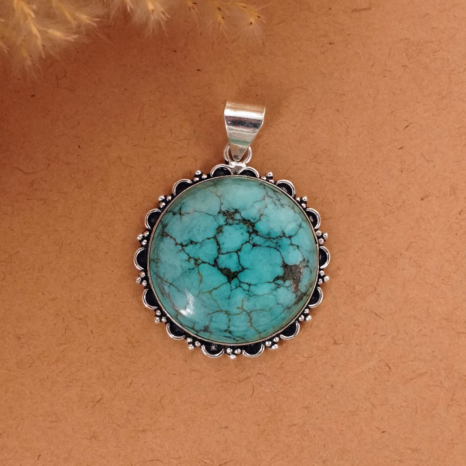 Natural Turquoise Sterling Silver Plated Handmade Pendant: Product ID: 260411133520 Product - Handmade Silver Plated Pendant Metal - 92.5 Sterling Silver Plated Pendant Size - 3.5 CM Gemstone - Turquoise Gemstone Origin - Tibet Gemstone Shape - Round Pendant 