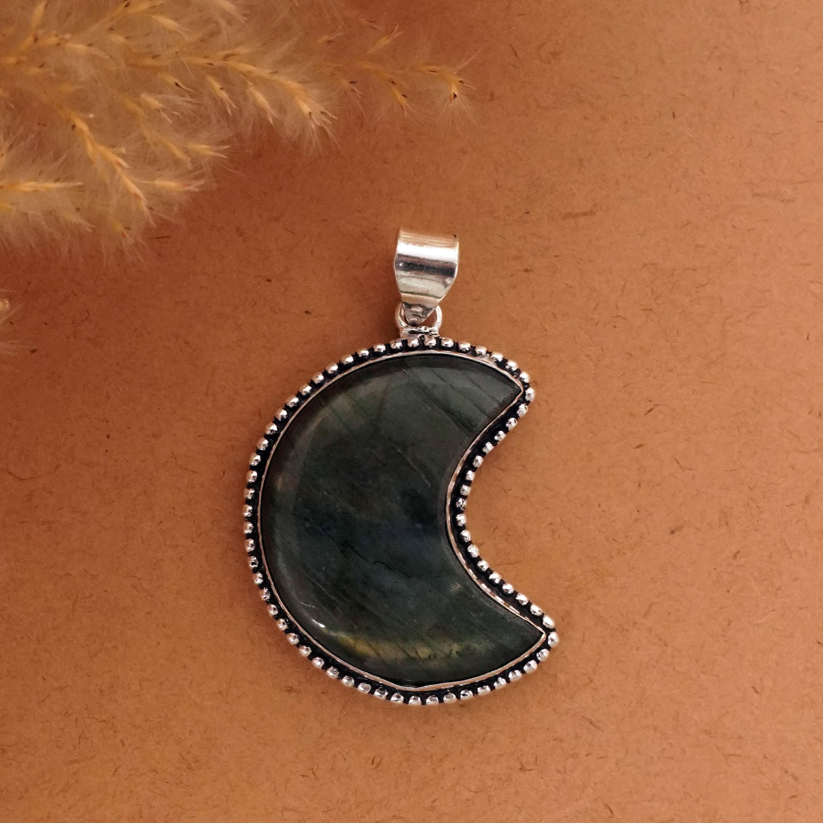 Natural Labradorite Sterling Silver Plated Handmade Moon Pendant: Product ID: 260411125521 Product - Handmade Silver Plated Pendant Metal - 92.5 Sterling Silver Plated Pendant Size - 4x2.5 CM Gemstone - Labradorite Gemstone Origin - Canada Gemstone Shape - Crescent 