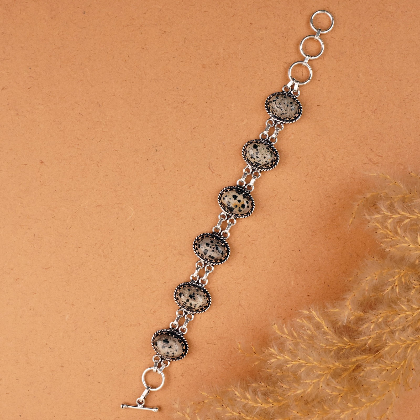 Natural Dalmatian Jasper Sterling Silver Plated Handmade Bracelet: Product ID: 260410135953 Product - Handmade Silver Plated Bracelet Metal - 92.5 Sterling Silver Plated Bracelet Length - 6 Inch + 2 Inch Gemstone - Dalmatian Gemstone Size -10X14 MM ( 6 Stone) Gemston