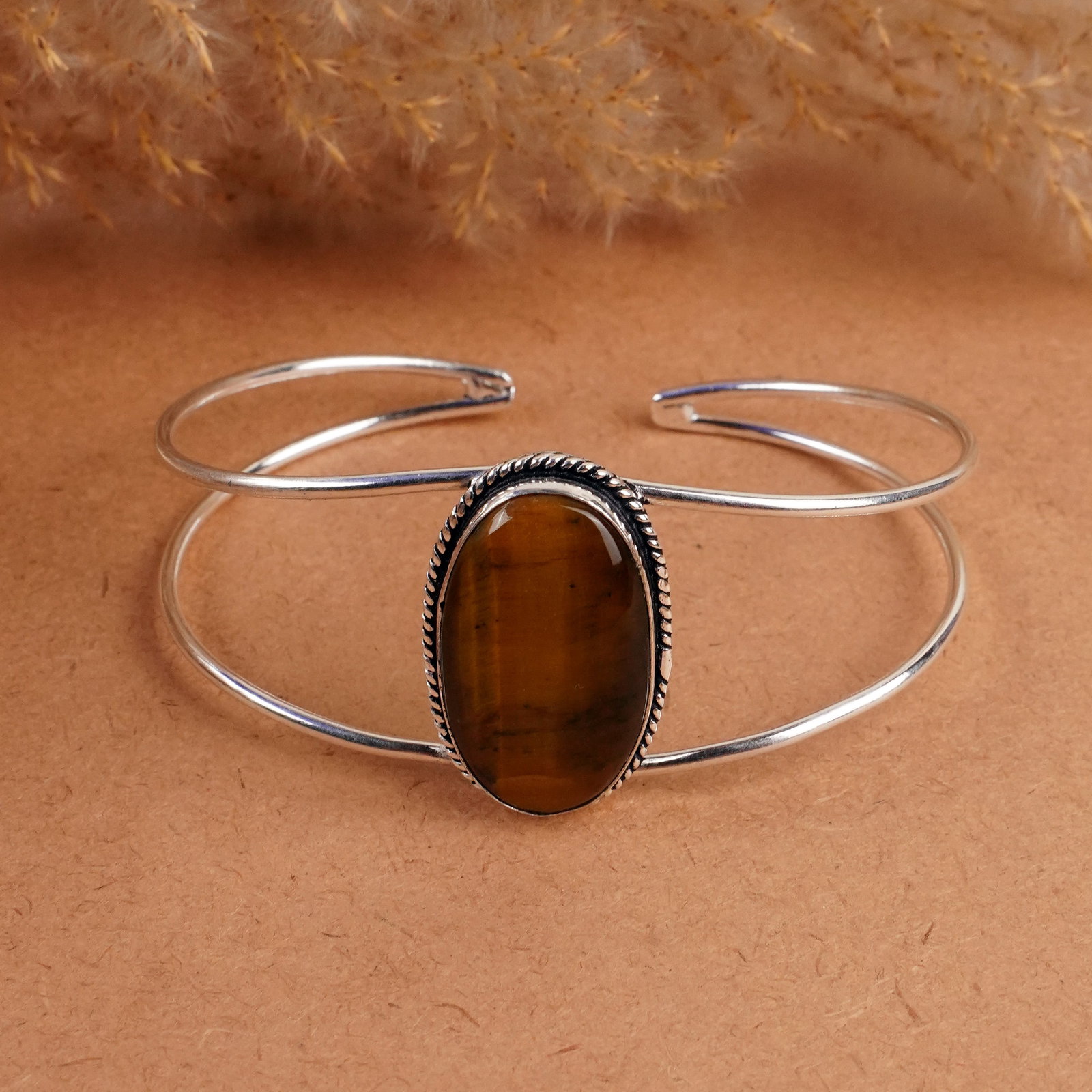Natural Tiger Eye Sterling Silver Plated Handmade Cuff Bangle: Product ID: 260408153121 Product - Handmade Silver Plated Cuff Bangle Metal - 92.5 Sterling Silver Plated Bangle Size - 7.5x5.5 CM (Adjustable) Gemstone - Tiger Eye Gemstone Origin - South Africa Gems