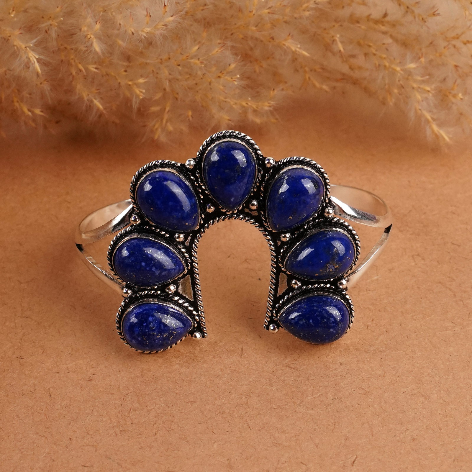 Natural Lapis Lazuli Sterling Silver Plated Handmade Pendant: Product ID: 260408152457 Product - Handmade Silver Plated Cuff Bangle Metal - 92.5 Sterling Silver Plated Bangle Size - 6.5x4 CM (Adjustable) Gemstone - Lapis Lazuli Gemstone Origin - Afghanistan Gems
