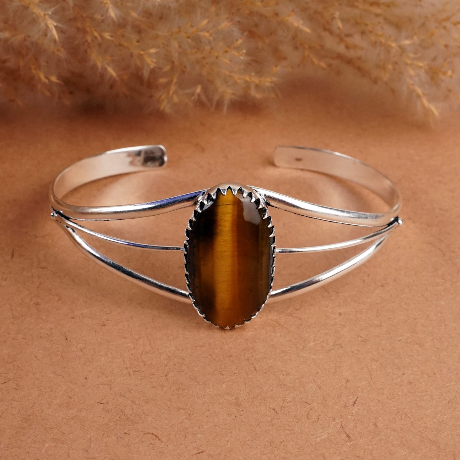 Natural Tiger Eye Sterling Silver Plated Handmade Cuff Bangle: Product ID: 260408151130 Product - Handmade Silver Plated Cuff Bangle Metal - 92.5 Sterling Silver Plated Bangle Size - 7x5.5 CM (Adjustable) Gemstone - Tiger Eye Gemstone Origin - South Africa Gemsto