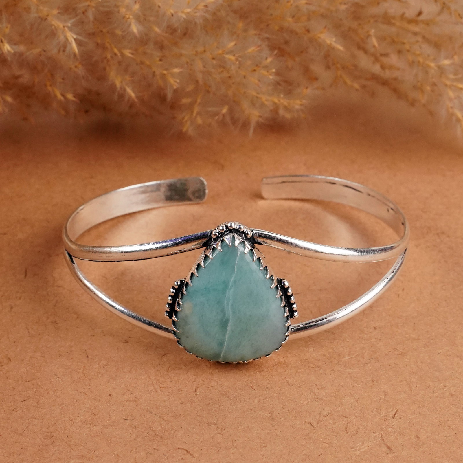 Natural Blue Opal Sterling Silver Plated Handmade Cuff Bangle: Product ID: 260408142402 Product - Handmade Silver Plated Cuff Bangle Metal - 92.5 Sterling Silver Plated Bangle Size - 7x5 CM (Adjustable) Gemstone - Blue Opal Gemstone Origin - Indonesia Gemstone Si