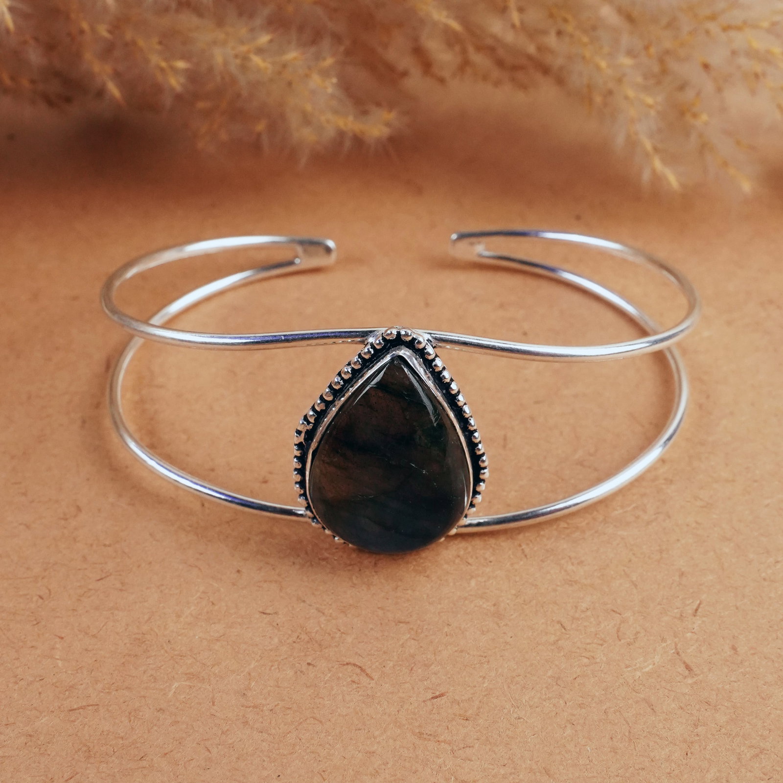 Natural Labradorite Sterling Silver Plated Handmade Cuff Bangle: Product ID: 260407184623 Product - Handmade Silver Plated Cuff Bangle Metal - 92.5 Sterling Silver Plated Bangle Size - 7.5x5 CM (Adjustable) Gemstone - Labradorite Gemstone Origin - Canada Gemstone S