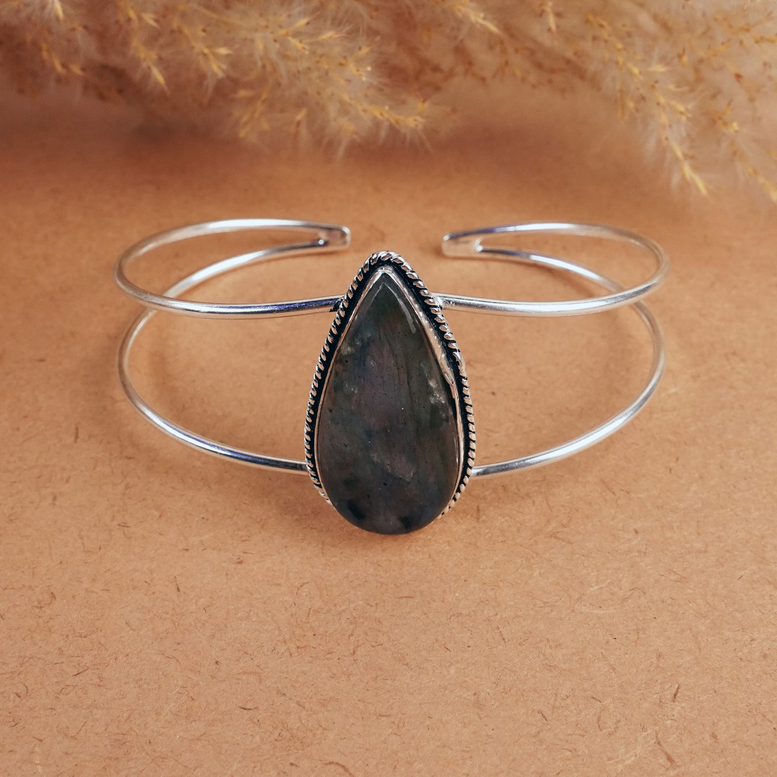 Natural Labradorite Sterling Silver Plated Handmade Cuff Bangle: Product ID: 260407192319 Product - Handmade Silver Plated Cuff Bangle Metal - 92.5 Sterling Silver Plated Bangle Size - 7.5x5.5 CM (Adjustable) Gemstone - Labradorite Gemstone Origin - Canada Gemstone