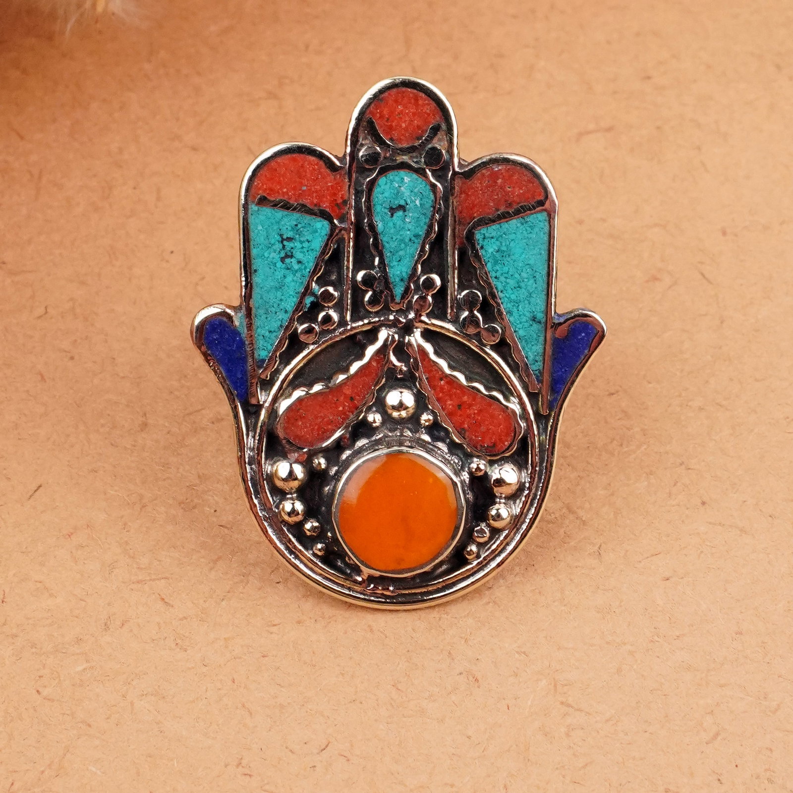 Tibetan Turquoise & Coral Handmade Fatima Hand Ring - Free Size: Product ID: 260406164938 Product - Tibetan Handmade Ethnic Ring Ring Size - Free Size Ring Weight - 17 Gram Gemstone - Natural Turquoise, Coral & Copal Metal - Brass & Copper mix Metal Origin - Nepal 