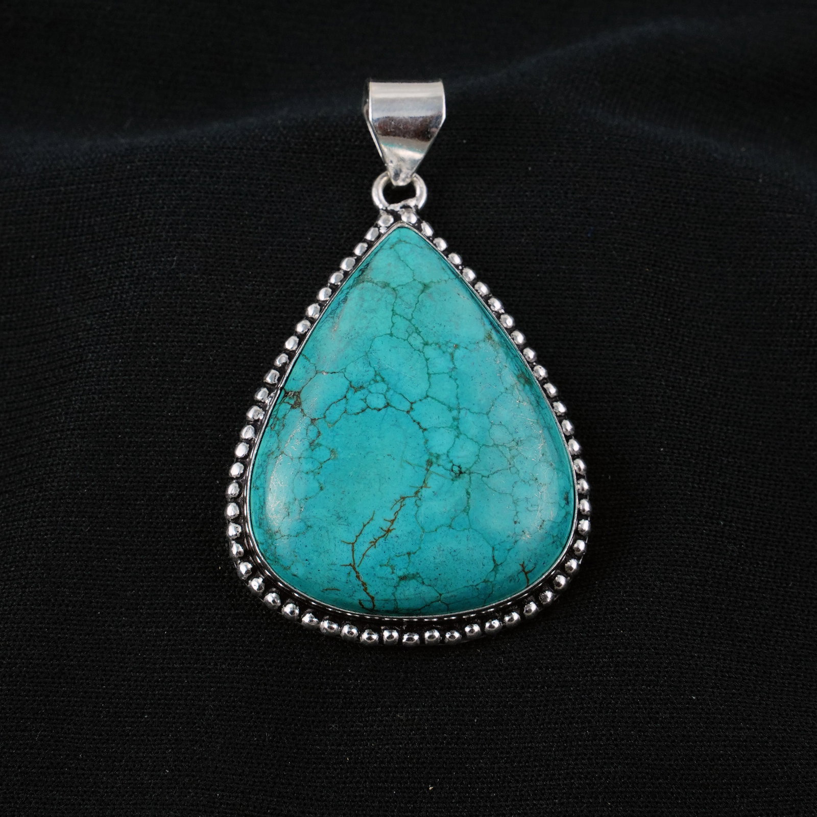 Natural Turquoise Sterling Silver Plated Handmade Pendant: Product ID: 260405101702 Product - Handmade Silver Plated Pendant Metal - 92.5 Sterling Silver Plated Pendant Size - 4x3 CM Gemstone - Turquoise Gemstone Origin - Tibet Gemstone Shape - Pear Pendant W