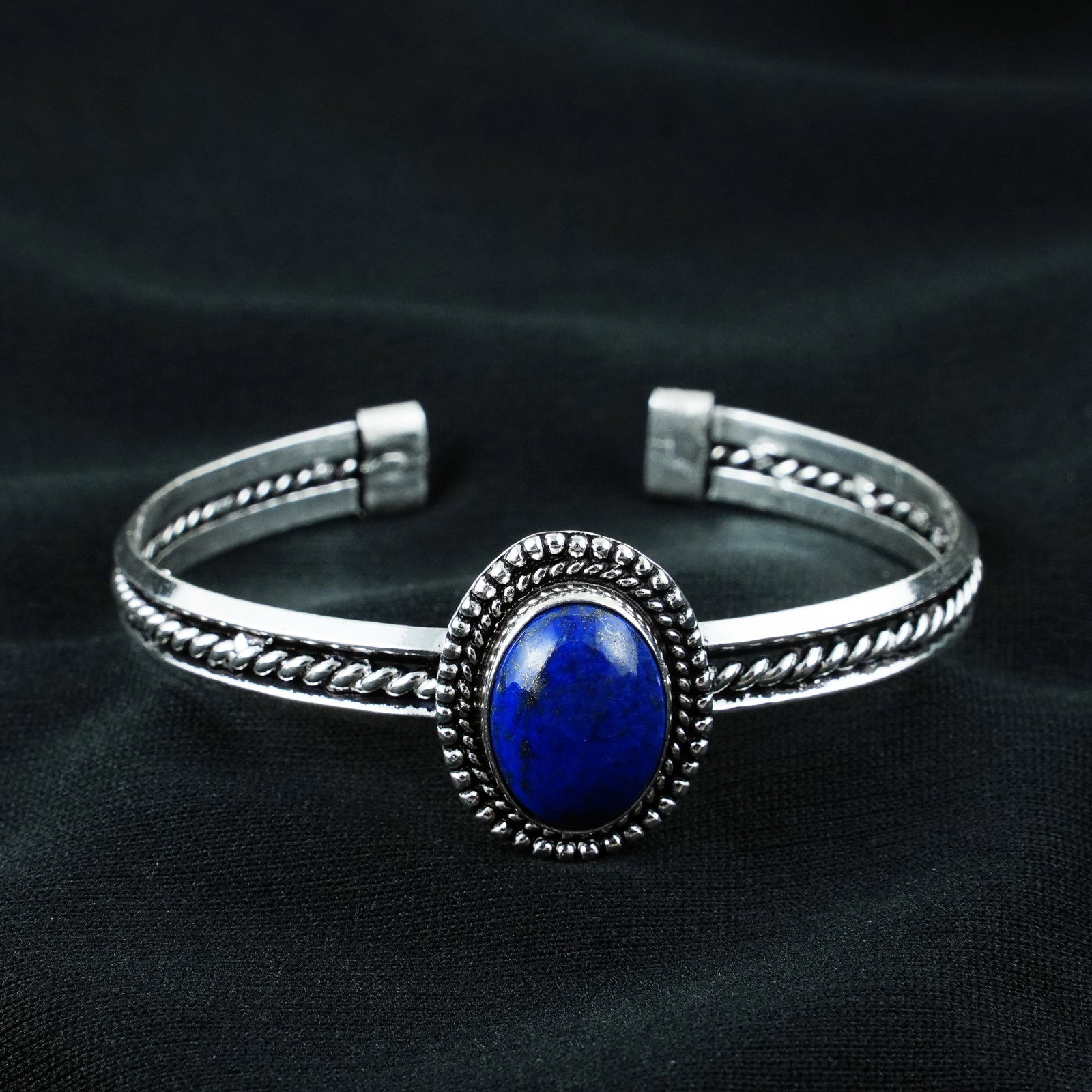 Natural Lapis Lazuli Sterling Silver Plated Handmade Cuff Bangle: Product ID: 260404140901 Product - Handmade Silver Plated Cuff Bangle Metal - 92.5 Sterling Silver Plated Bangle Size - 6.5x5.5 CM (Adjustable) Gemstone - Lapis Lazuli Gemstone Origin - Afghanistan Ge