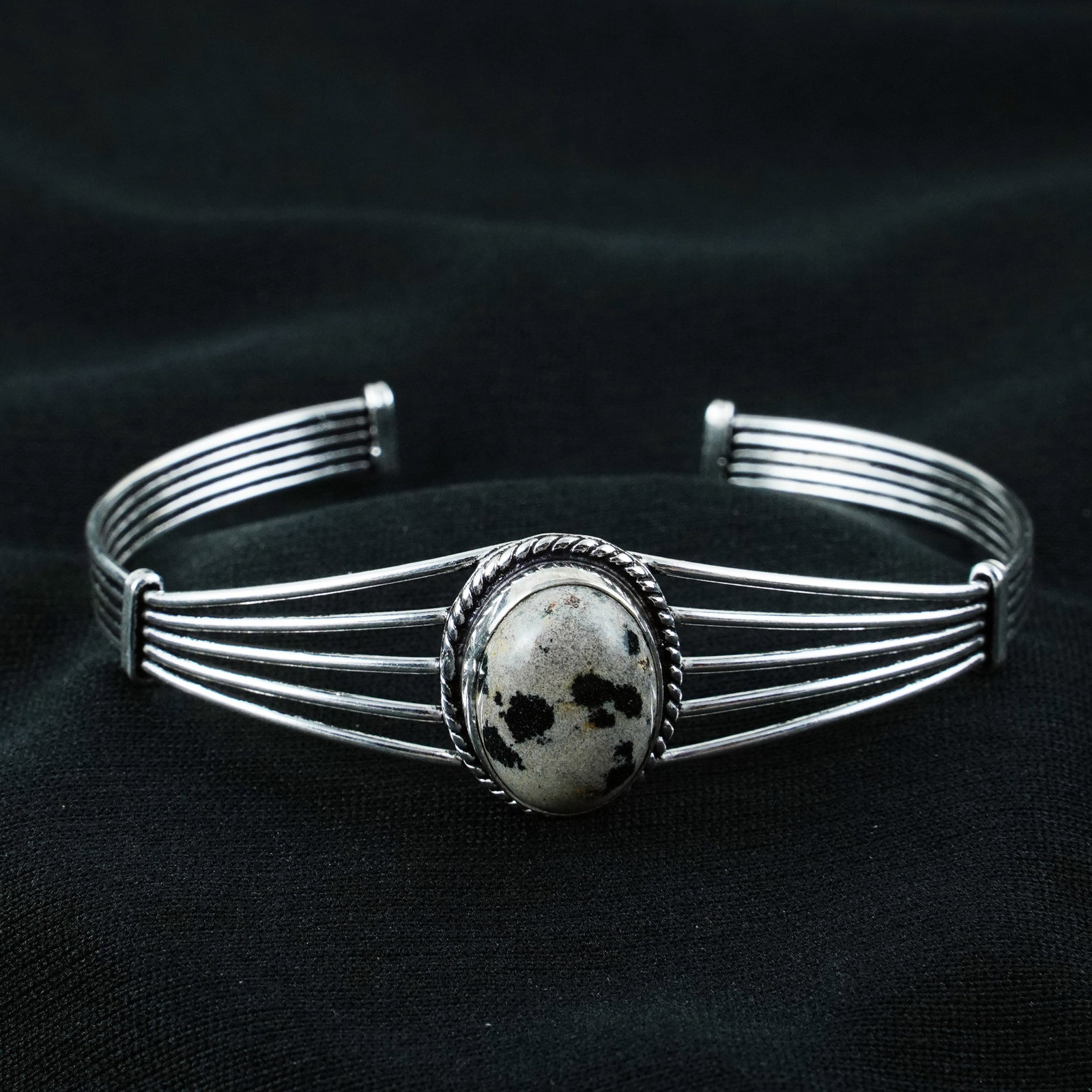 Natural Dalmatian Jasper Sterling Silver Plated Handmade Cuff Bangle: Product ID: 260404140504 Product - Handmade Silver Plated Cuff Bangle Metal - 92.5 Sterling Silver Plated Bangle Size - 6.5x5 CM (Adjustable) Gemstone - Dalmatian Jasper Gemstone Origin - Mexico Gemst