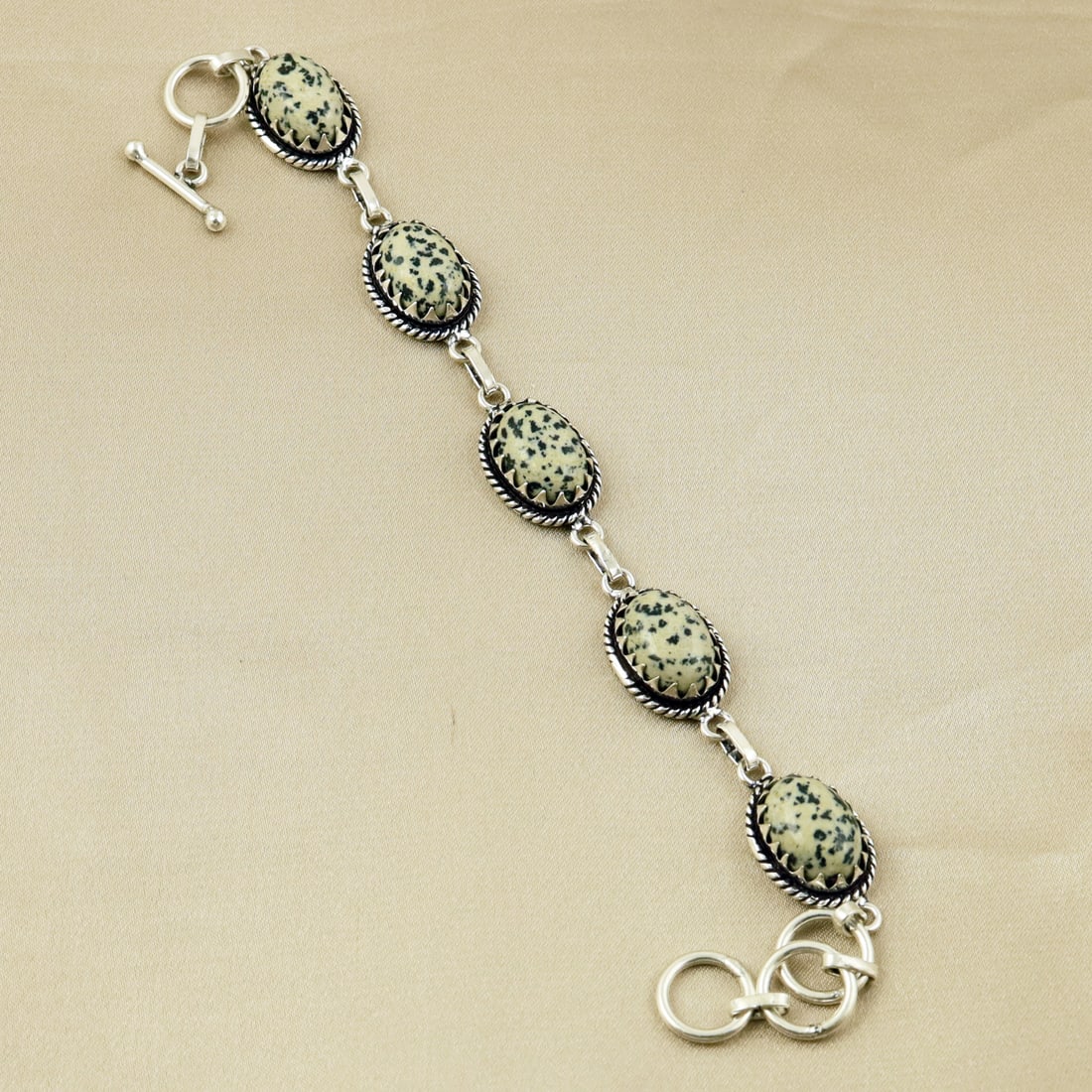 Natural Dalmatian Jasper Sterling Silver Plated Handmade Bracelet: Product ID: 260403155345 Product - Handmade Silver Plated Bracelet Metal - 92.5 Sterling Silver Plated Bracelet Length - 5 Inch + 2 Inch Gemstone - Dalmatian Jasper Gemstone Size -10X14 ( 5 Stone) Gem