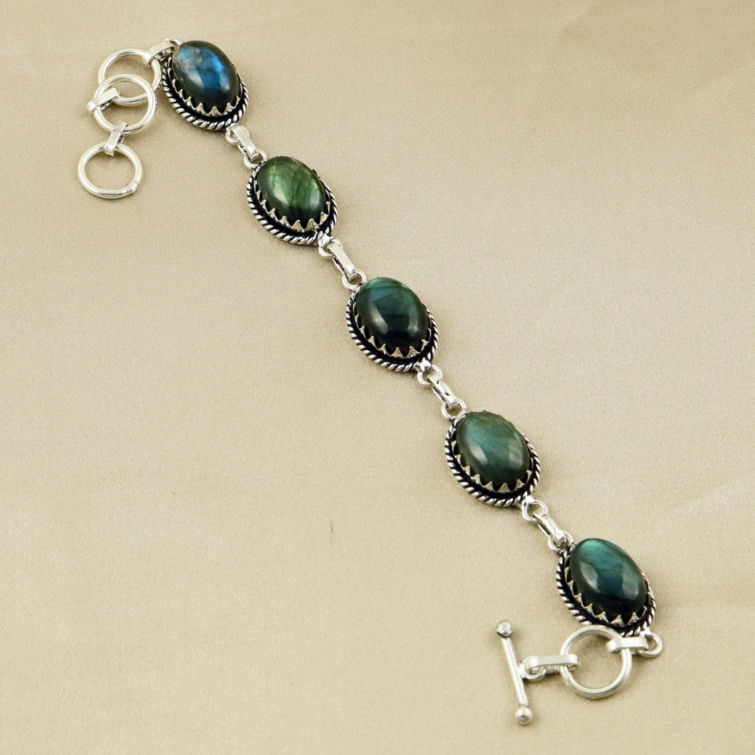 Natural Labradorite Sterling Silver Plated Handmade Bracelet: Product ID: 260403155233 Product - Handmade Silver Plated Bracelet Metal - 92.5 Sterling Silver Plated Bracelet Length - 6 Inch + 2 Inch Gemstone - Labradorite Gemstone Size -10X14 ( 5 Stone) Gemstone