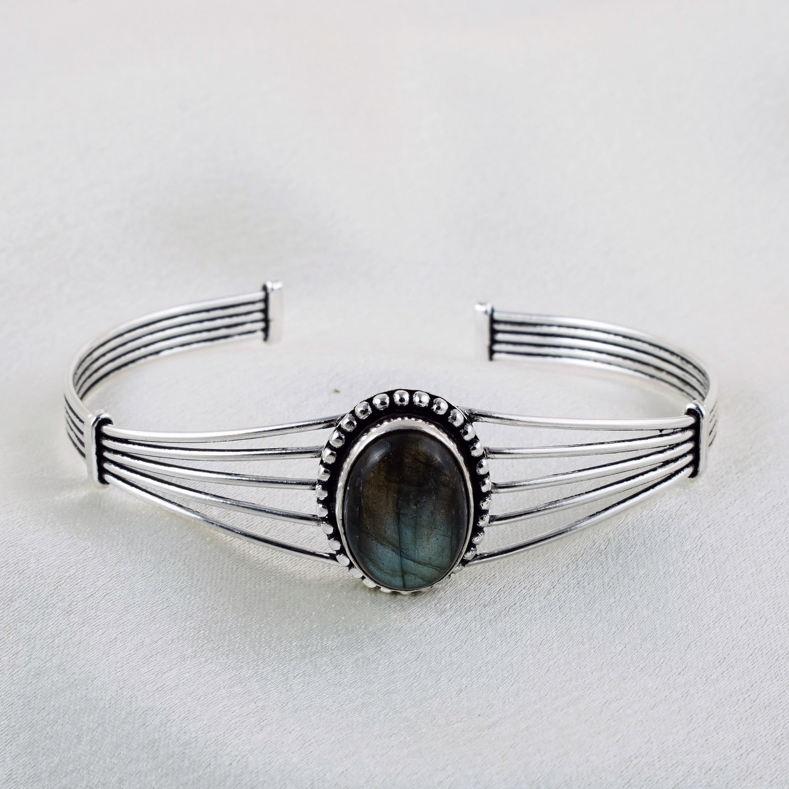 Natural Labradorite Sterling Silver Plated Handmade Cuff Bangle: Product ID: 260331143829 Product - Handmade Silver Plated Cuff Bangle Metal - 92.5 Sterling Silver Plated Bangle Size - 7x5.5 CM (Adjustable) Gemstone - Labradorite Gemstone Origin - Canada Gemstone S