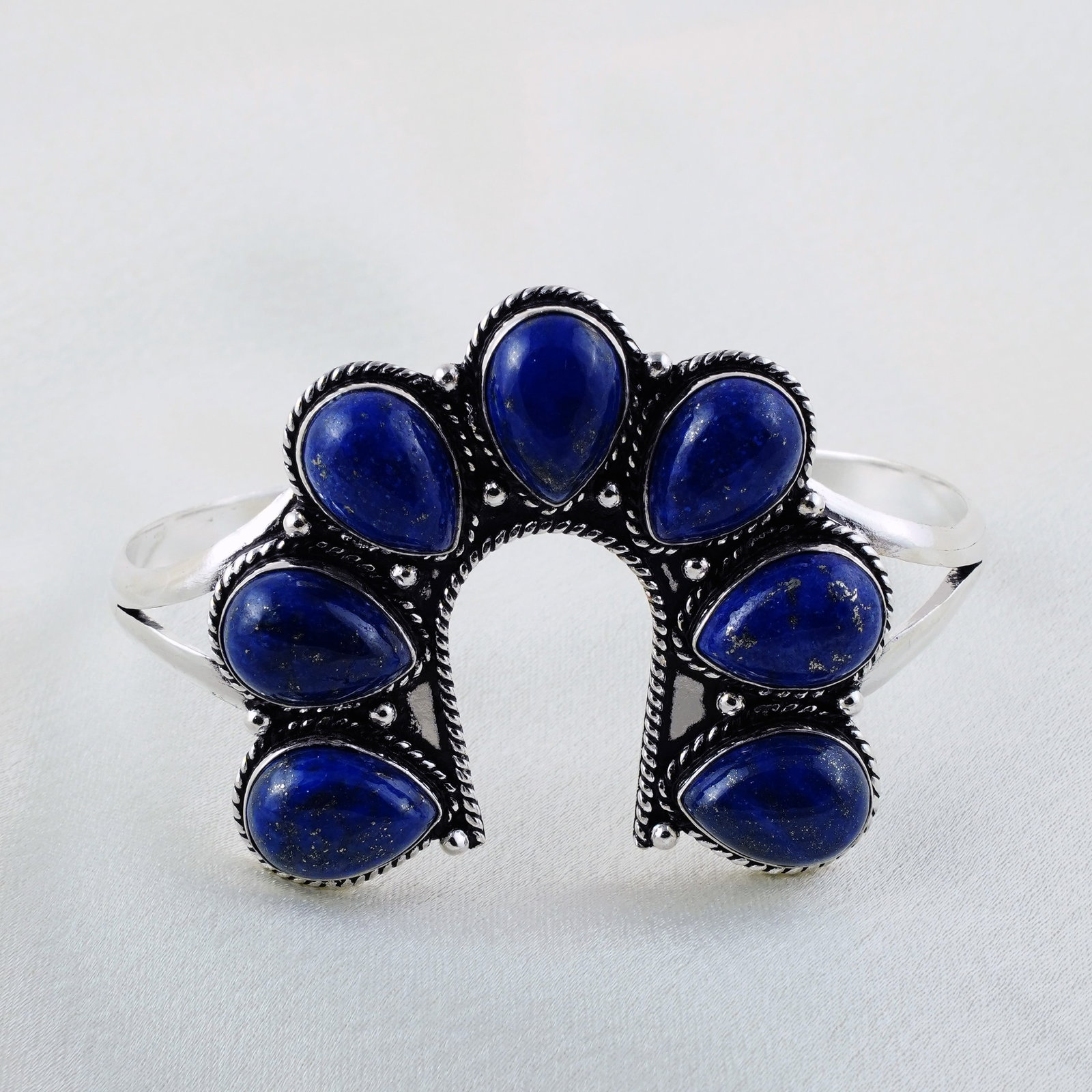 Natural Lapis Lazuli Sterling Silver Plated Handmade Cuff Bangle: Product ID: 260331143256 Product - Handmade Silver Plated Cuff Bangle Metal - 92.5 Sterling Silver Plated Bangle Size - 6.5x4 CM (Adjustable) Gemstone - Lapis Gemstone Origin - Afghanistan Gemstone Si