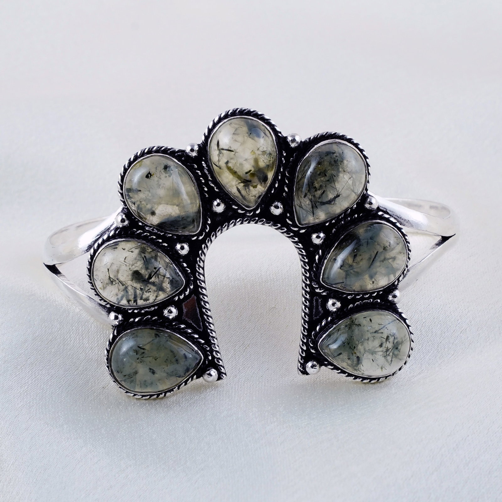 Natural Prehnite Sterling Silver Plated Handmade Cuff Bangle: Product ID: 260331142710 Product - Handmade Silver Plated Cuff Bangle Metal - 92.5 Sterling Silver Plated Bangle Size - 7x5.5 CM (Adjustable) Gemstone - Prehnite Gemstone Origin - South Africa Gemston