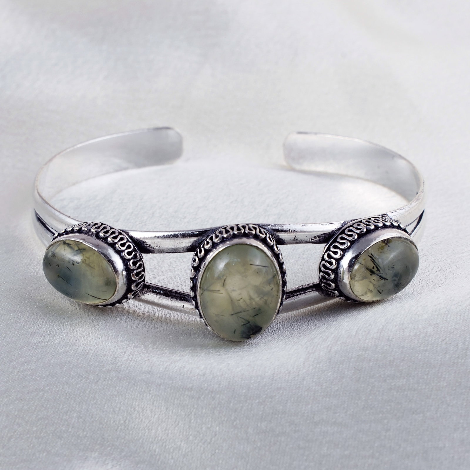 Natural Prehnite Sterling Silver Plated Handmade Cuff Bangle: Product ID: 260331142051 Product - Handmade Silver Plated Cuff Bangle Metal - 92.5 Sterling Silver Plated Bangle Size - 6.5x5 CM (Adjustable) Gemstone - Prehnite Gemstone Origin - South Africa Gemston