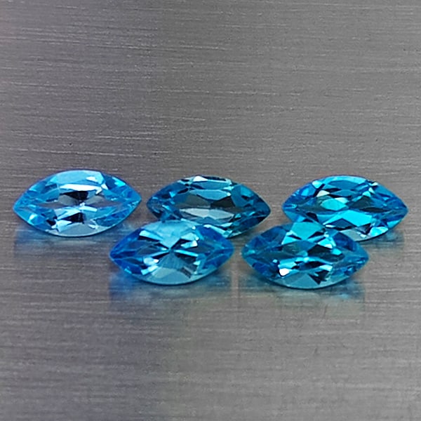Natural Swiss Blue Topaz Gemstones 5.78 Ct. 5 Pcs. Marquise Shape 9.9 x 5.3 Mm.: Product ID: 807168709 Product Name: Natural Blue Topaz Weight: 5.78 CT. Size: 9.9 x 5.3 x 3.5 MM. Shape: Marquise Shape Color: Swiss Blue Clarity:VSI Luster: Good Gems Origin: Brazil Treatment: Treate