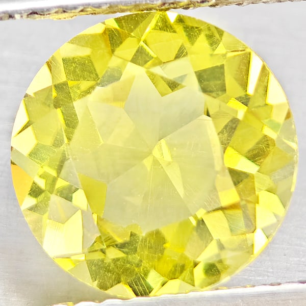 Natural Yellow Lemon Quartz Gemstones 2.53 Ct. Round Shape 9.1 Mm.: Product ID: 805530137 Product Name: Natural Quartz Weight: 2.53 CT. Size: 9.1 x 9.1 x 5.7 MM. Shape: Round Color: Yellow Lemon Clarity:VSI Luster: Good Gems Origin: Brazil Treatment: Unheated Crystal 