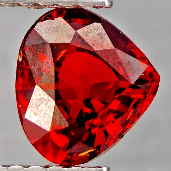 Natural Orangish Red Spessartine Garnet Gemstones 1.22 Ct. Pear Shape 6.8 x 6.2 Mm.: Product ID: 802937234 Product Name: Natural Garnet Weight: 1.22 CT. Size: 6.8 x 6.2 x 3.6 MM. Shape: Pear Shape Color: Orangish Red Clarity:VSI Luster: Very Good Gems Origin: Namibia Treatment: Unheat