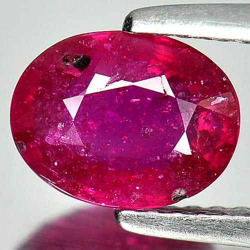 Natural Purplish Pink Ruby Gemstones 1.67 Ct. Oval Shape 8 x 6.2 Mm.: Product ID: 805926547 Product Name: Natural Ruby Weight: 1.67 CT. Size: 8 x 6.2 x 3.5 MM. Shape: Oval Color: Purplish Pink Clarity:VSI Luster: Good Gems Origin: Mozambique Treatment: Heated (Lead-glas