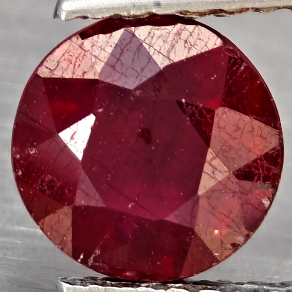 Natural Pinkish Red Ruby Gemstones 1.71 Ct. Round Shape 7.1 Mm.: Product ID: 805935863 Product Name: Natural Ruby Weight: 1.71 CT. Size: 7.1 x 7.1 x 4.2 MM. Shape: Round Color: Pinkish Red Clarity:SI1 Luster: Good Gems Origin: Madagascar Treatment: Heated (Lead-gla