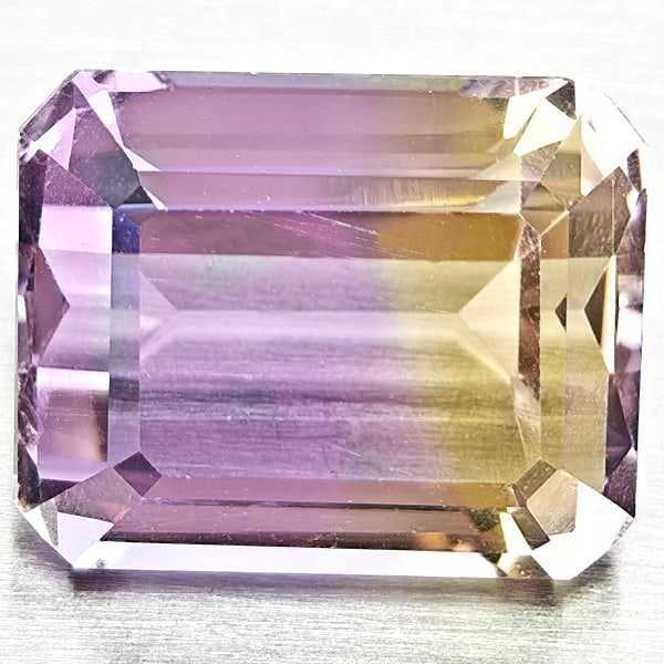 Natural Bi Color Ametrine Gemstones 4.03 Ct. Octagon Shape 10.4 x 8.4 Mm.: Product ID: 800408449 Product Name: Natural Ametrine Weight: 4.03 CT. Size: 10.4 x 8.4 x 6.2 MM. Shape: Octagon Color: Bi Color Clarity:VSI Luster: Good Gems Origin: Bolivia Treatment: Unheated Crysta