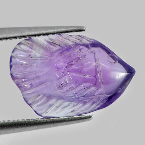 Natural Purple Amethyst Gemstones 4.02 Ct. Fish Carving 15.7 x 10.6 Mm.: Product ID: 810303611 Product Name: Natural Amethyst Weight: 4.02 CT. Size: 15.7 x 10.6 x 4.8 MM. Shape: Fish Carving Color: Purple Clarity:Semi - Transparent Luster: Good Gems Origin: Brazil Treatmen