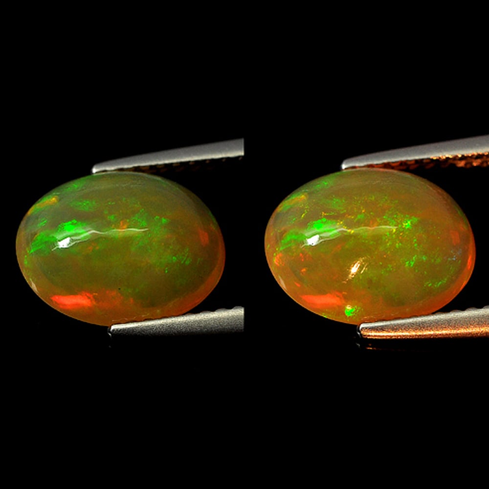 Natural Multi Color Opal Gemstones 1.94 Ct. Oval Cabochon Shape 10.8 x 8.7 Mm.: Product ID: 818727107 Product Name: Natural Opal Weight: 1.94 CT. Size: 10.8 x 8.7 x 5 MM. Shape: Oval Cabochon Color: Multi-Color Clarity:Semi - Transparent Luster: Iridescent Gems Origin: Ethiopia T