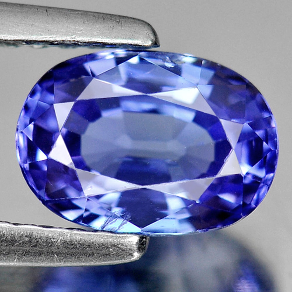Natural Blue Tanzanite Gemstones 1.41 Ct. Oval Shape 7.8 x 5.5 Mm.: Product ID: 807009165 Product Name: Natural Tanzanite Weight: 1.41 CT. Size: 7.8 x 5.5 x 4.1 MM. Shape: Oval Color: Violet Blue Clarity:SI Luster: Good Gems Origin: Tanzania Treatment: Heated Crystal 