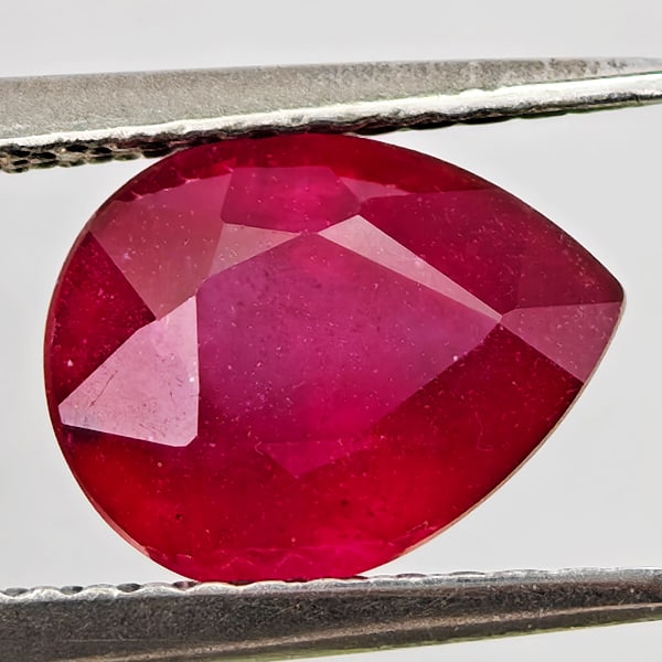 Natural Purplish Red Ruby Gemstones 2.53 Ct. Pear Shape 9 x 7.2 Mm: Product ID: 805935532 Product Name: Natural Ruby Weight: 2.53 CT. Size: 9 x 7.2 x 5 MM. Shape: Pear Shape Color: Purplish Pink Clarity:VSI - SI1 Luster: Good Gems Origin: Madagascar Treatment: Heated 