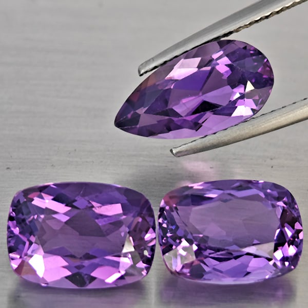 Natural Purple Amethyst Gemstones 8.65 Ct. 3 Pcs. Mixed Shape and Mixed Size: Product ID: 800325635 Product Name: Natural Amethyst Weight: 8.65 CT. Size: 12.8 x 6.6 x 5.7 to 10.7 x 8 x 5.6 MM. Shape: Mixed Shape Color: Purple Clarity:VSI Luster: Good Gems Origin: Brazil Treatme