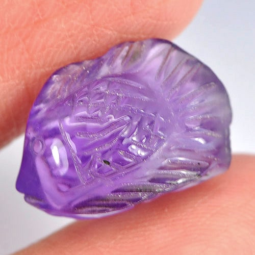 Natural Violet Amethyst Gemstones 6.17 Ct. Fish Carving Shape 15.7 x 10.4 Mm.: Product ID: 810303703 Product Name: Natural Amethyst Weight: 6.17 CT. Size: 15.7 x 10.4 x 6.7 MM. Shape: Fish Carving Color: Violet Clarity:Semi - Transparent Luster: Good Gems Origin: Brazil Treatmen