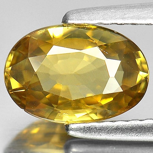 Natural Yellow Zircon Gemstones 2.30 Ct. Oval Shape 8.8 x 6 Mm.: Product ID: 807724762 Product Name: Natural Zircon Weight: 2.30 CT. Size: 8.8 x 6 x 3.8 MM. Shape: Oval Color: Yellow Clarity:VSI Luster: Good Gems Origin: Cambodia Treatment: Heated Crystal Structure