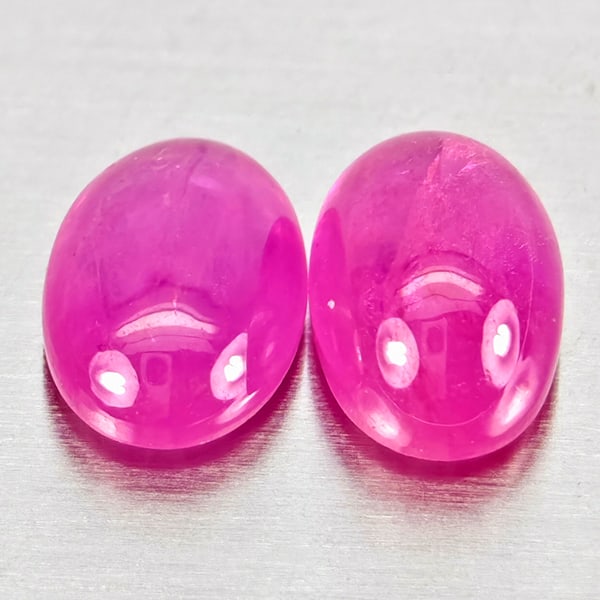 Natural Pink Red Jonson Ruby Gemstones 1.35 Ct. 2 Pcs. Oval Cabochon Shape 6.1 x 4 Mm.: Product ID: 805935766 Product Name: Natural Ruby Weight: 1.35 CT. Size: 6.1 x 4 x 3 MM. Shape: Oval Cabochon Color: Pink Red Clarity:Semi - Transparent Luster: Good Gems Origin: Mozambique Treatment: 