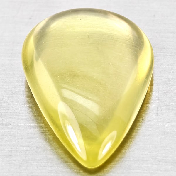 Natural Yellow Lemon Quartz Gemstones 16.20 Ct. Pear Cabochon Shape 23 x 16.3 Mm.: Product ID: 805530033 Product Name: Natural Quartz Weight: 16.20 CT. Size: 13 x 16.3 x 17.1 MM. Shape: Pear Cabochon Color: Yellow Lemon Clarity:Semi - Transparent Luster: Good Gems Origin: Brazil Tre