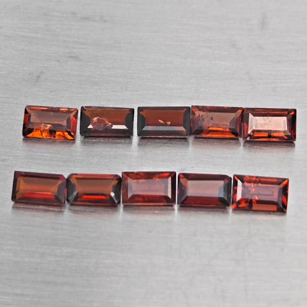 Natural Orangish Red Garnet Gemstones 3.34 Ct. 10 Pcs. Baguette Shape 5.2 x 3.2 Mm.: Product ID: 802937887 Product Name: Natural Red Garnet Weight: 3.34 CT. Size: 5.2 x 3.2 x 2.1 MM. Shape: Baguette Shape Color: Orangish Red Clarity:SI1 Luster: Good Gems Origin: Tanzania Treatment: Un