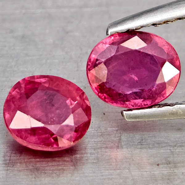 Natural Pinkish Red Ruby Gemstones 1.80 Ct. 2 Pcs. Oval Shape 6 x 5.6 Mm.: Product ID: 805935968 Product Name: Natural Ruby Weight: 1.80 CT. Size: 6 x 5.6 x 3.2 MM. Shape: Oval Shape Color: Pinkish Red Clarity:SI1 Luster: Good Gems Origin: Madagascar Treatment: Heated (Lead-