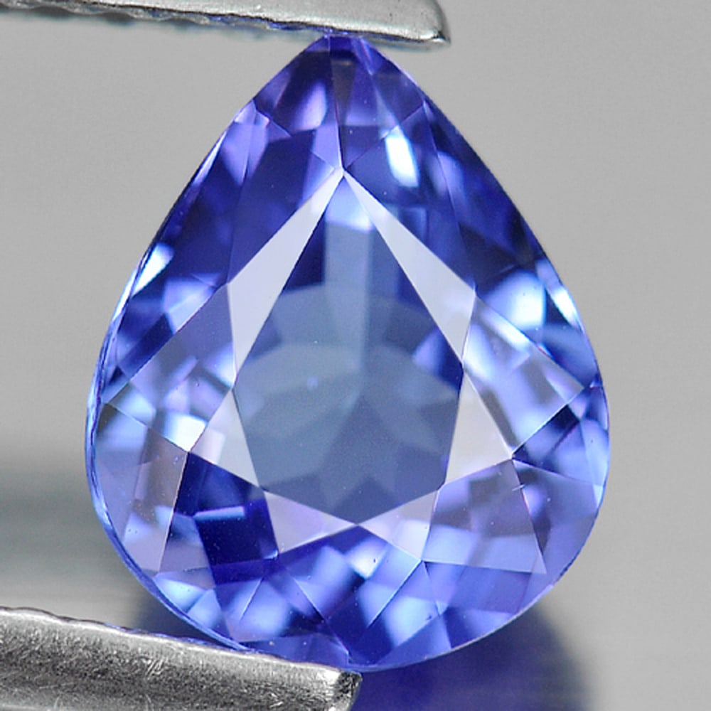 Natural Blue Tanzanite Gemstones 1.43 Ct. Clean Pear Shape 8.4 x 6.9 Mm.: Product ID: 807006266 Product Name: Natural Tanzanite Weight: 1.43 CT. Size: 8.4 x 6.9 x 4 MM. Shape: Pear Color: Violetish Blue Clarity:IF Luster: Very Good Gems Origin: Tanzania Treatment: Heated Cr