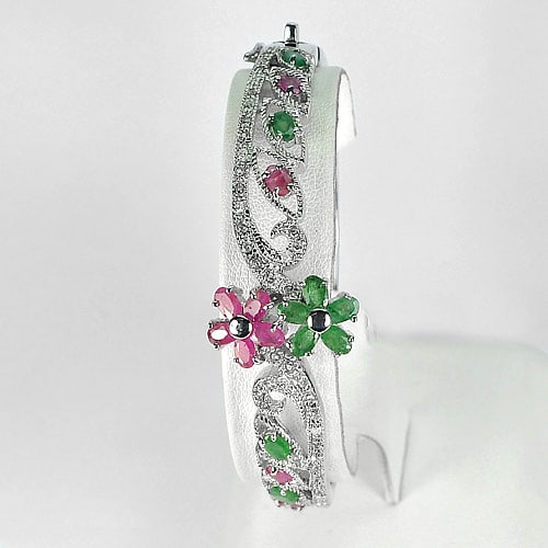 Natural Green Emerald and Ruby 925 Sterling Silver Bangle Jewerly 23.84 Grams: Product ID: 201100169 Product Name: Sterling Silver Bangle Product Type: 925 Sterling Silver Fine Jewelry Jewelry Weight: 23.84 Grams. Gemstones Color: Multi-Color Metal: Solid Silver 92.5%. Gemstone 