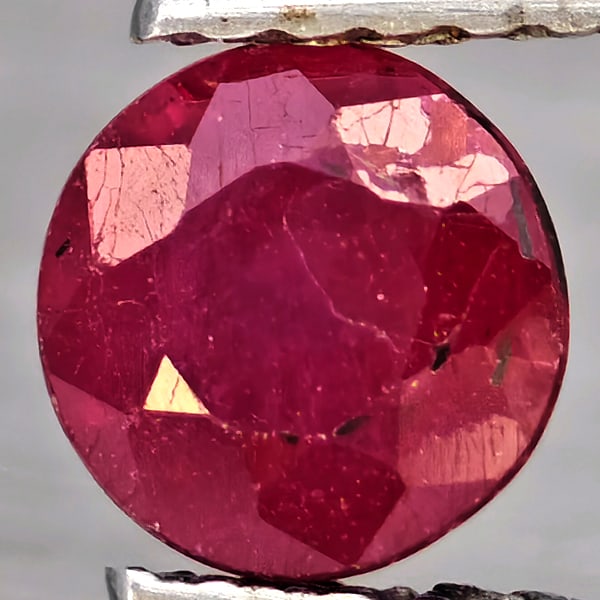 Natural Pinkish Red Ruby Gemstones 0.88 Ct. Round Shape 5.5 Mm.: Product ID: 805935875 Product Name: Natural Ruby Weight: 0.88 CT. Size: 5.5 x 5.5 x 3.7 MM. Shape: Round Color: Pinkish Red Clarity:SI1 Luster: Good Gems Origin: Madagascar Treatment: Heated (Lead-gla